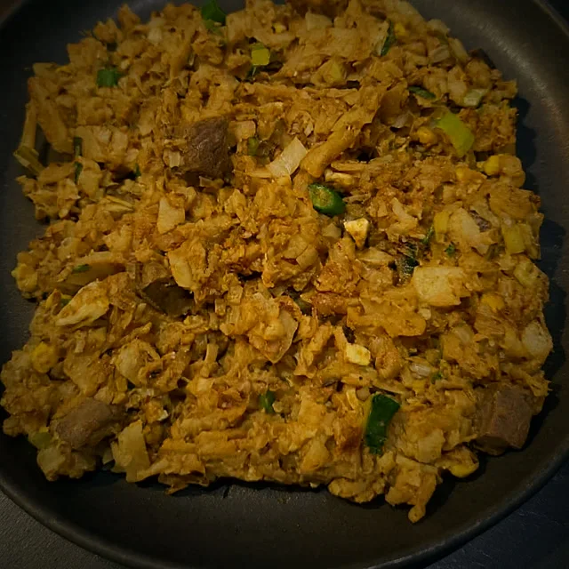 Kothu rotti, chopped roti with egg, vegetables and meat