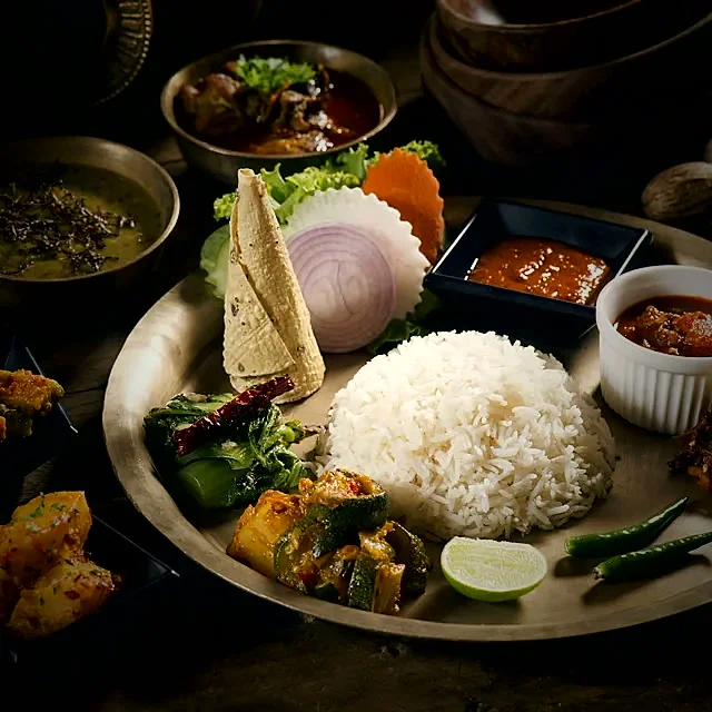 Rice and curry served on a banana leaf at BMS
